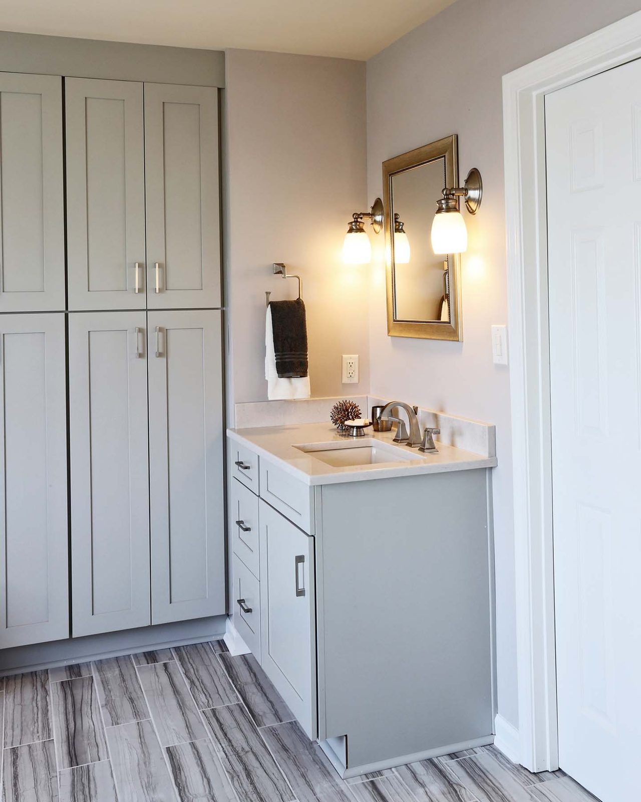 Traditional bathroom vanity cabinetry with decorative trim