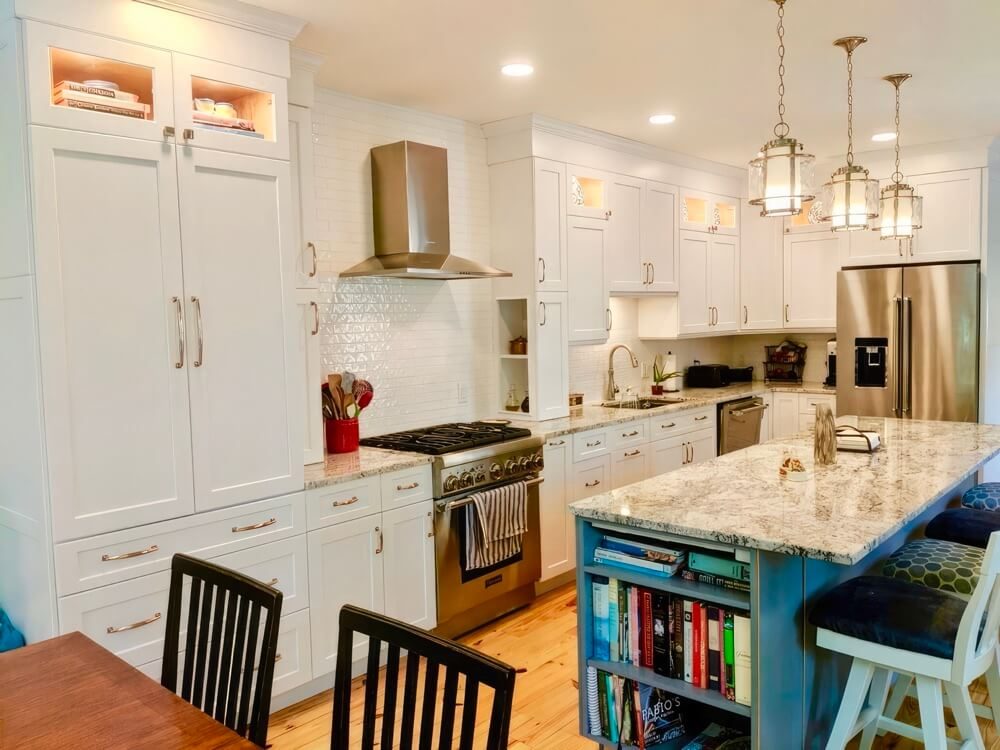 White shaker kitchen cabinets with island in a West Palm Beach home